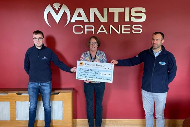A photo of Mcmenamin engineering and mantis cranes staff who climbed Mount Errigal for charity
